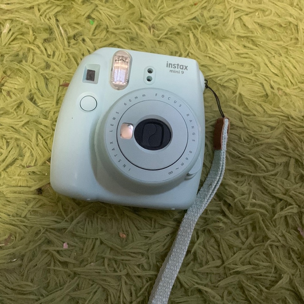 blue polaroid camera